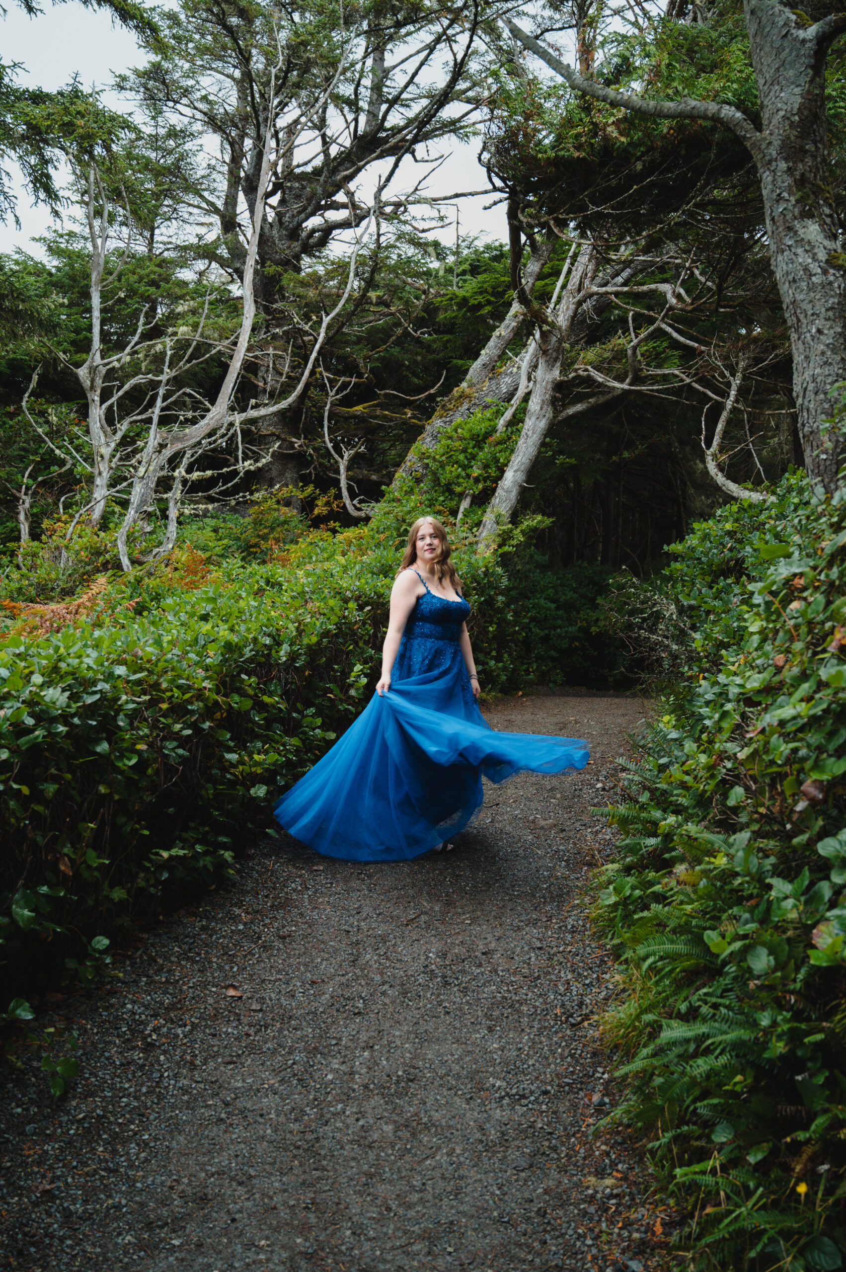 Close-up of blue flowy dress moving in the wind on the Wild Pacific Trail